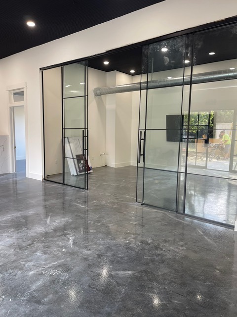 Modern office space with glass partition wall painting Houston TX